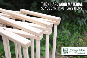 wooden clothes drying rack made of thick hardwood for durability and support